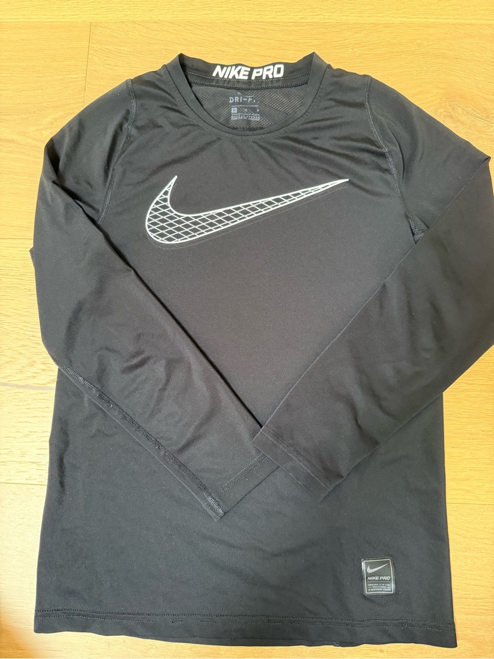 Nike Black Pro Long Sleeve Training Top with Silver Logo Patch